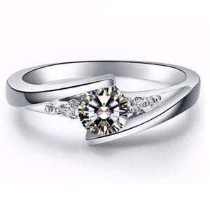 White Sapphire Silver Toned Engagement Ring